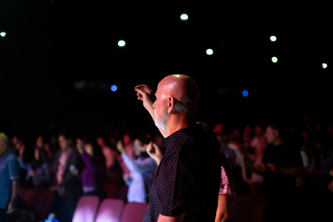 comedian on stage performing