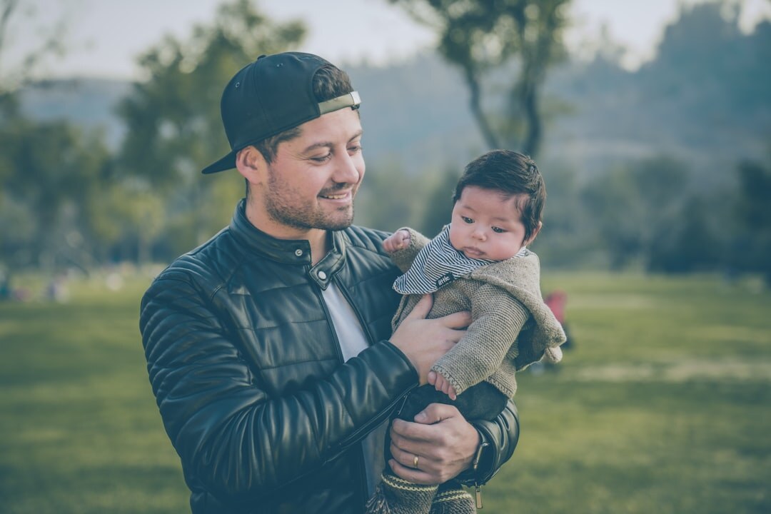 singer holding baby