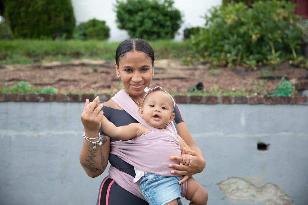 singer holding baby